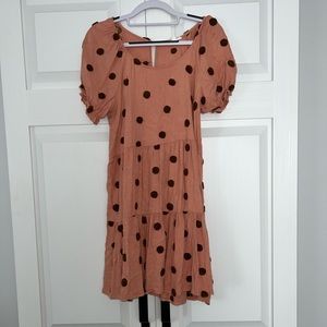 Mauve polka dot cap sleeve dress.